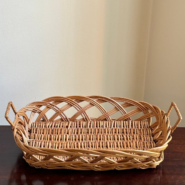 Offering a beautiful mid-20th century Mediterranean-style basket tray. Love the intricate openwork design and sturdy...