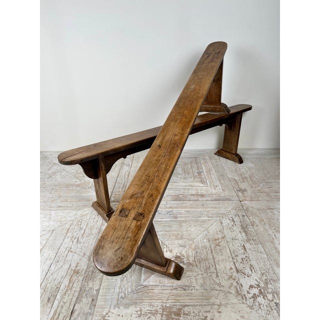 This wonderful pair of antique French fruitwood benches ranks among the nicest we have offered. Their simply carved aprons...