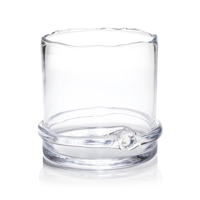 A true work of art, this handmade, mouth-blown glass vase doubles as a champagne bucket. Featuring an organic uneven rim...