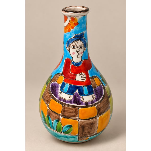 Bold, expressive, and full of storytelling charm—this mid-century Italian hand-painted DeSimone vase features a lively...