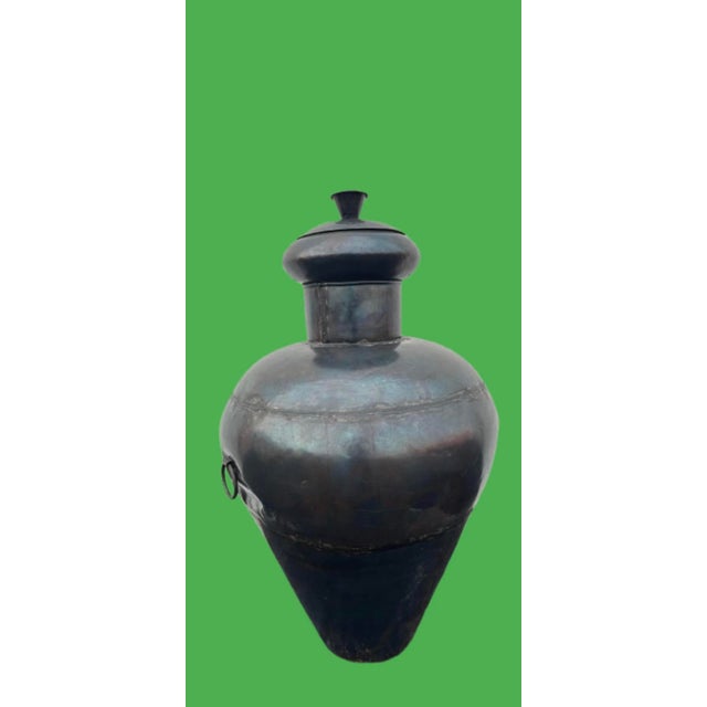 Monumental iron metal pot from India. Great to display indoor or outdoor a statement piece very large with age patina....