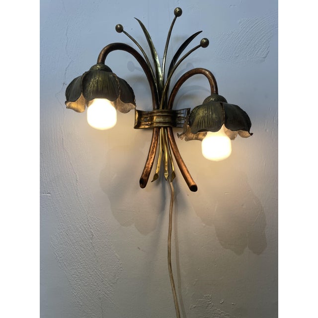 Unfortunately, I haven't been able to find out the designer/manufacturer of this unique, extravagant lamp. Its design is...