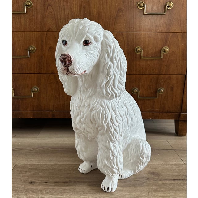 Life size, 19" tall ceramic white poodle made in Italy and hand-signed. Excellent condition and in need of a home.