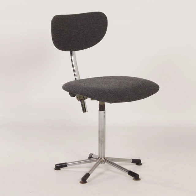 Desk chair model 2311 with anthracite grey fabric from the “Efficient” series designed by Toon de Wit in 1960s. Both the...