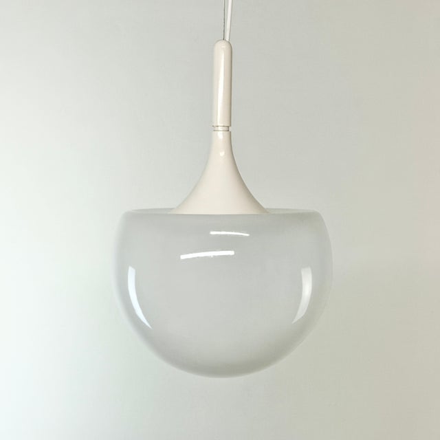Pendant lamp designed in the 1960s by elio martinelli for martinelli luce. mushroom-shaped and space age-style. the...