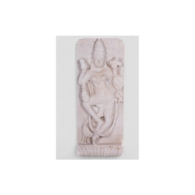 This captivating Hindu sculpture from Northern India represents the Goddess Lakshmi, symbolizing beauty and wealth in...
