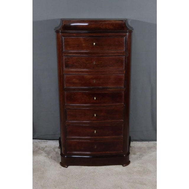 Napoleon III period furniture composed in the upper part of a flap simulating 3 drawers and four drawers of the same...