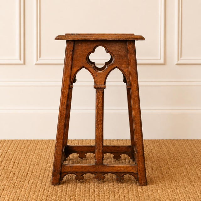 This striking 19th century Belgian Neogothic pedestal table is a beautifully crafted example of Gothic Revival oak...