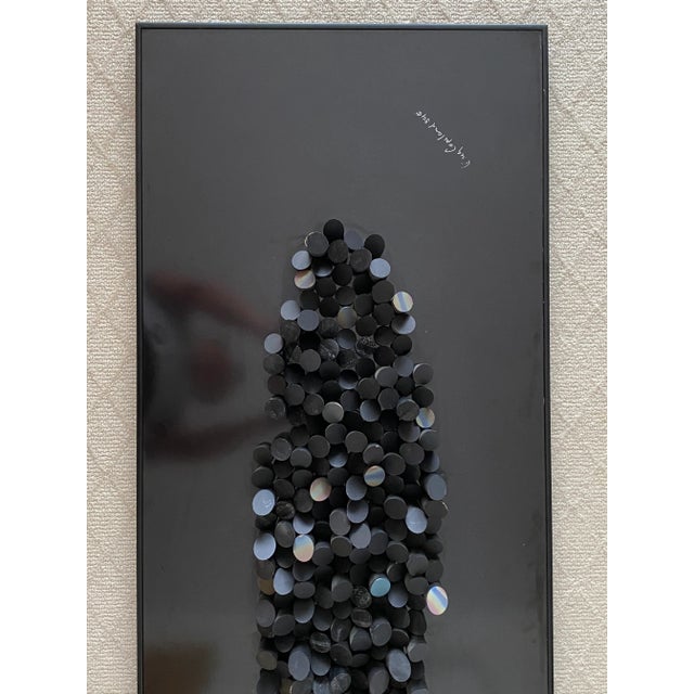 Both modern and organic, wood wall sculpture by Greg Copeland are circular pieced-wood compositions mounted on mylar board...