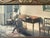 Charming Antique French Trumeau Mirror featuring an image of a woman in a parlor at a piano. Original wood frame in great...