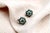 White gold earrings in the shape of a shower with brilliant-cut diamonds (24) and calibrated emeralds. Metal: Gold....