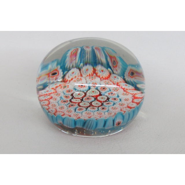 This wonderful Paper Weight is made of art glass. This stunning vintage piece features a colorful millefiori pattern...