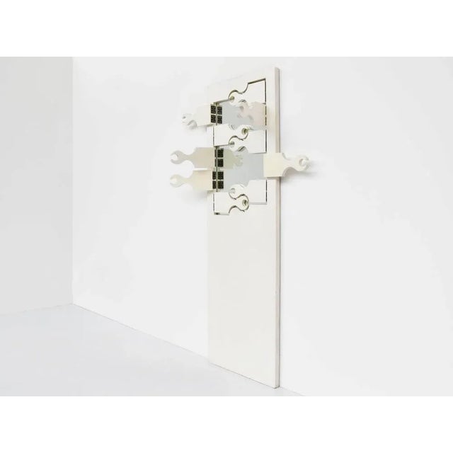 Italian Skorpio Folding Coat Rack with Mirror by Anonima Design for Bonetto, 1970, in Good conditions. Designed 1970 to...