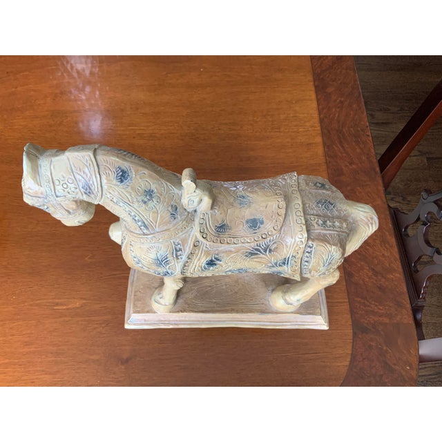 Isn’t she lovely? Carved wooden warrior horse. Perfect addition to a bookshelf or any room in your house.