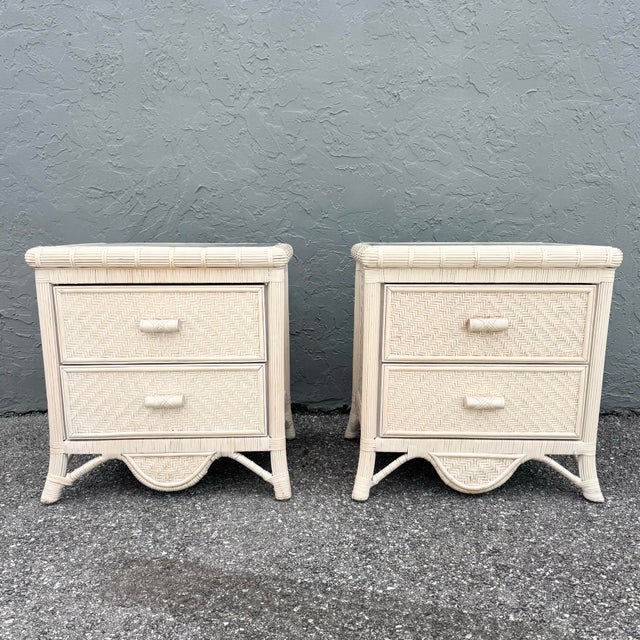 A charming pair of boho chic wicker nightstands, showcasing a light, airy aesthetic with coastal influence. Crafted with...
