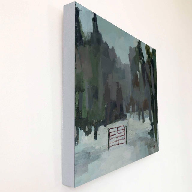 This oil painting captures a serene winter landscape, featuring a solitary red gate set against a backdrop of muted greens...