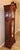 An exceptional Howard Miller Presidential Collection grandfather clock featuring an ornate swan-neck bonnet, richly...