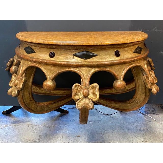 Extraordinary Italian venetian console from 1920 with an amazing shape. Nothing touches, nothing clashes, which gives this...