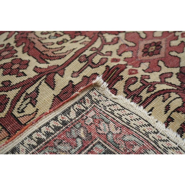 Ivory is probably the most popular Farahan Sarouk ground tone, and this example features a color tending slightly toward...