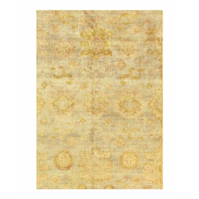 Original Turkish OUSHAK Design. Handmade Hand-knotted. Lamb's wool on a Cotton foundation. From India. This rug has a...