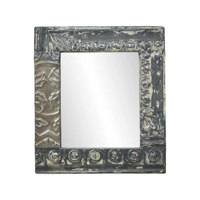 Experience the allure of this one of a kind handcrafted wall mirror, crafted from antique 100 year old tin ceiling tiles...
