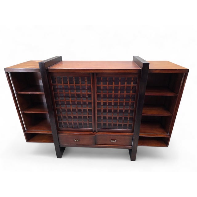 Vintage Modern Handcrafted Mahogany Media Console with Sliding Woven Doors – by South Cone, Peru A beautifully crafted...