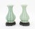 Pair of Chinese Celadon Glazed Porcelain Yuhuchunping Vases, each of lobed pear vase form and with carved wood stand....