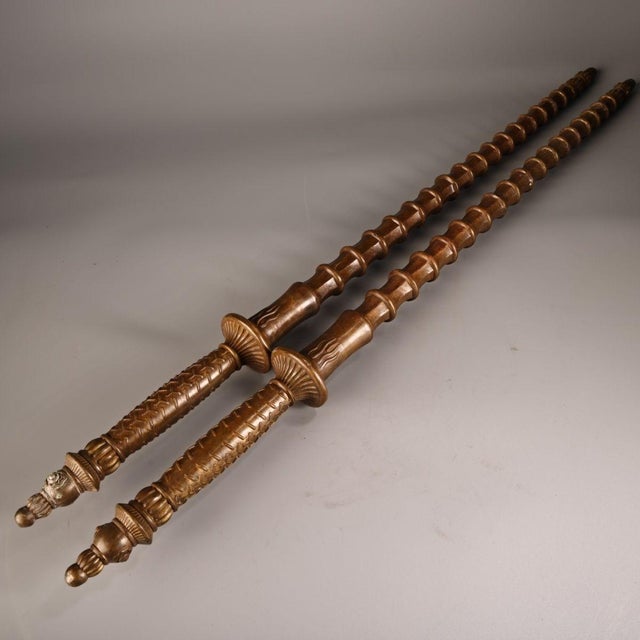 This striking pair of bronze weapons, known as jian or maces, is traditionally associated with guardian deities and...