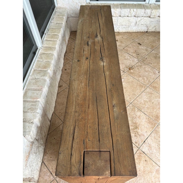 Reclaimed oak timbers from decades-old buildings in Europe lend richness to this simple, linear collection from artisan...