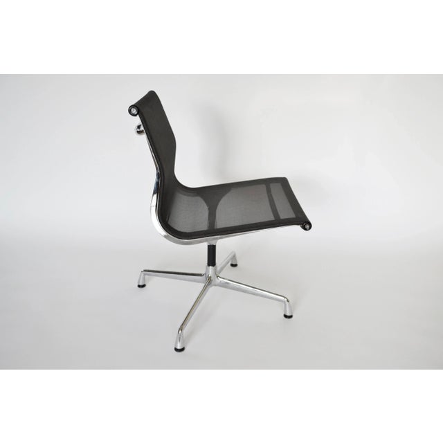 This is an original Model EA 107 steel office chair by Charles & Ray Eames for Vitra. It was designed in 1958 and made in...