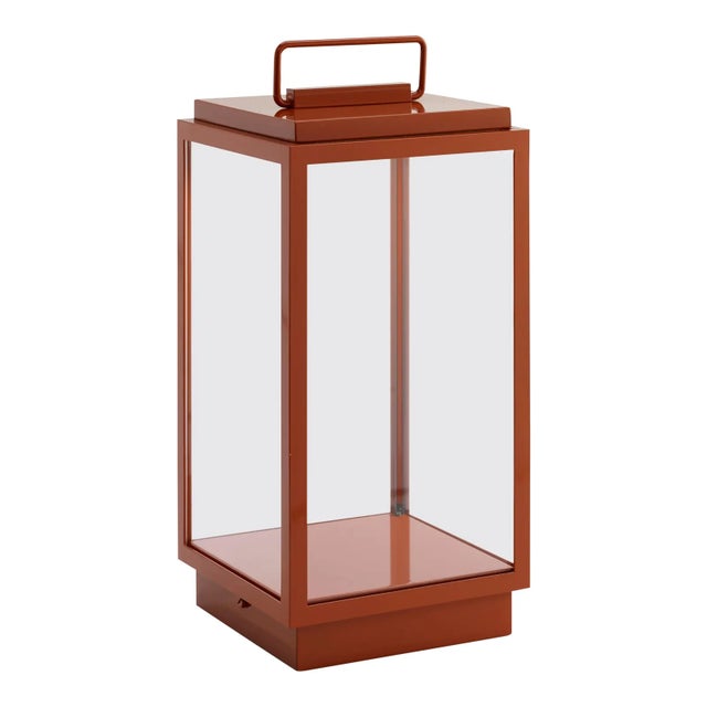 Eclectic table lamp in bronze lacquered in color with inside fitted glass. Supplied with rechargeable Li-ion battery at...