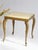 A small rectangular vintage Neoclassical table with an onyx top and beautiful curved brass legs and an ornate frame. The...