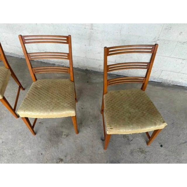 These 4 vintage Ladder Back Wooden Dining Chairs are in very good structural condition, with no major imperfections to the...