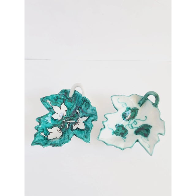 Vintage Mid-Century Italian handpainted ceramic leaf form bowl with handles. The decorative handcrafted bowls can be...