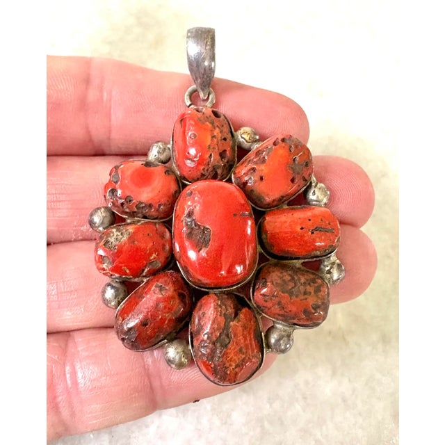 Stunning, large vintage coral and sterling silver pendant. Antique coral used to make vintage pendant.