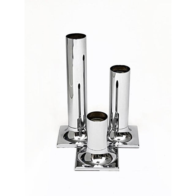 Trio of chromed metal spotlights produced by the German company staff and designed by designer Rolf Krüger in 1966. The...