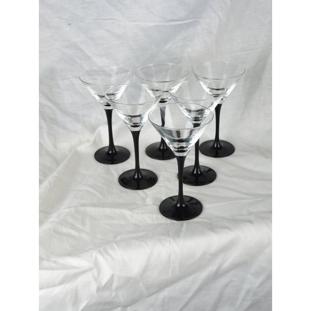 Set of 6 french black stemmed martini glasses. Bright and elegant, these retro glasses keep a modern spirit and will fit...