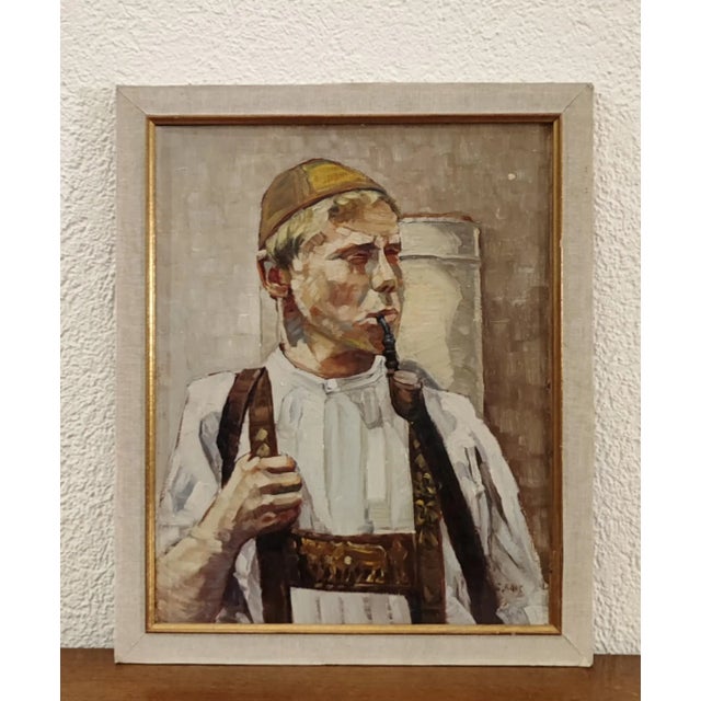 G. Baur, Berger des Alpes et sa pipe, Oil on Wood, Framed, in Flawless conditions. Designed 1920 to 1949 This piece has an...