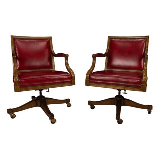 Pair of 1980s Baker Furniture Rolling Executive Chairs in Carved Wood & Burgundy Vinyl Upholstery For Sale