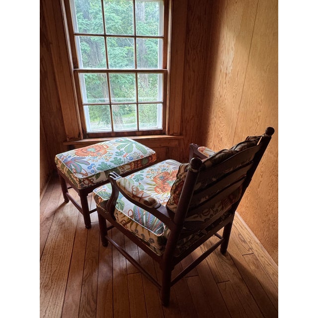 A wonderfully comfortable country-style armchair and matching ottoman, professionally custom-reupholstered in Josef...