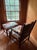 A wonderfully comfortable country-style armchair and matching ottoman, professionally custom-reupholstered in Josef...