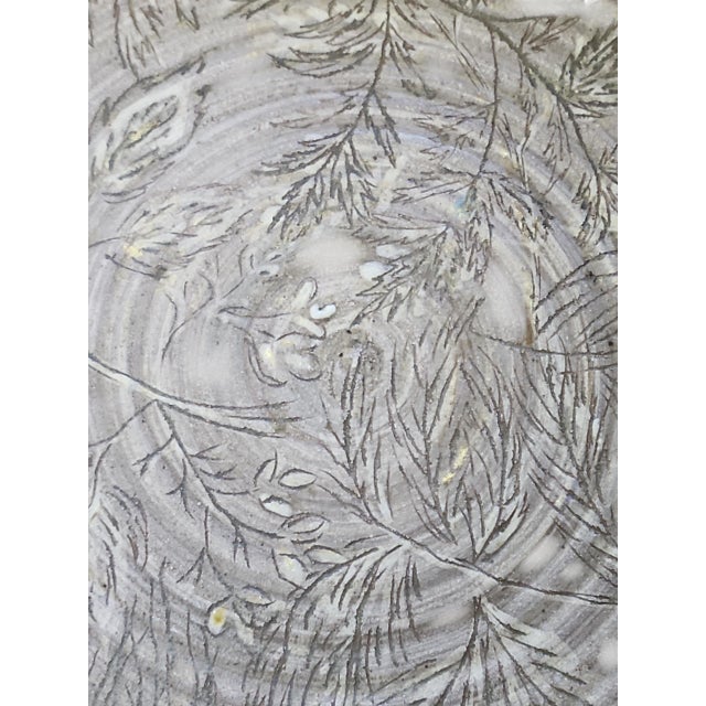 Lovely unique large studio pottery charger in excellent condition, with foliage motif, in excellent condition. Artist...