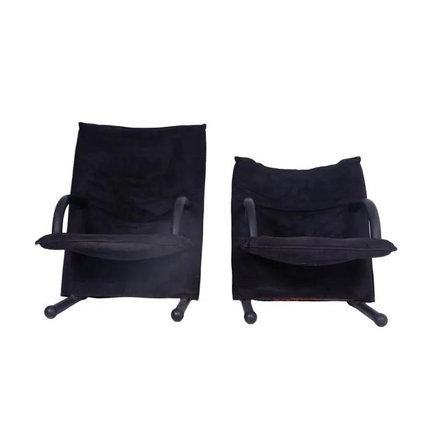 Burkhard Vogtherr for Arflex, pair of 80s armchairs in suede. the measurements of the armchairs are the same, with a...
