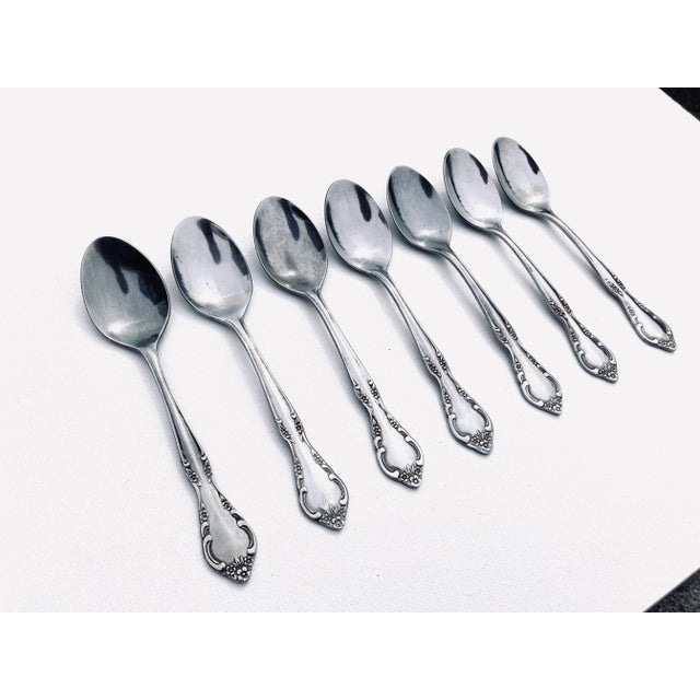 Vintage stainless steel set of 7 tea spoons 6"L , Makers mark reads " Estia Stainless Indonesia " Cascade Pattern. Very...