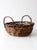 Charming mid-century handwoven vine basket with naturally rustic character and organic appeal. Crafted from intertwined...