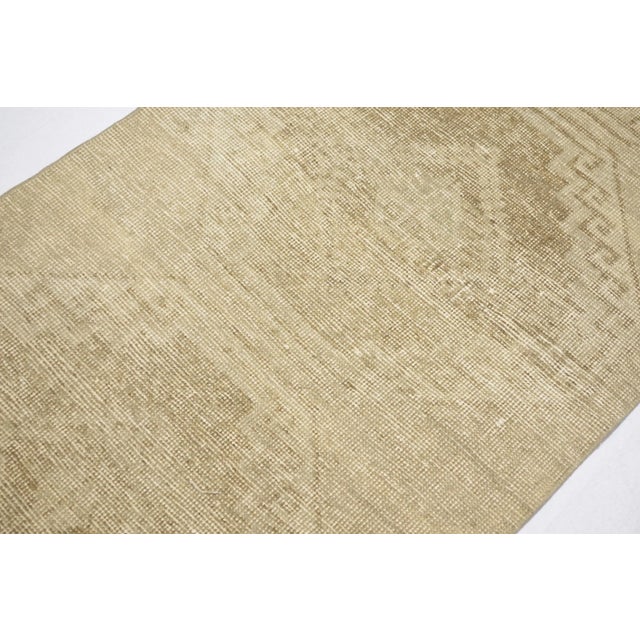 Vintage Turkish Hand-Knotted Hallway Runner Rug is a semi-Vintage rug. '60s Eastern region of Turkey's unique rug is...