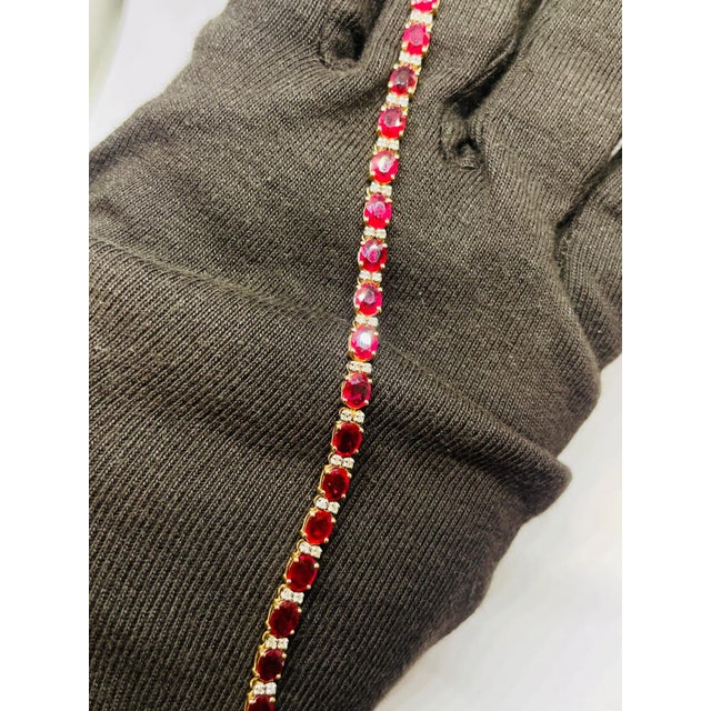 Gold Purity: 18K Solid Gold (stamped) DIAMOND: 0.43 CTS RUBY: 9.75 CTS 18K GOLD GROSS WEIGHT: 8.39 GRAMS NET WEIGHT: 6.35...
