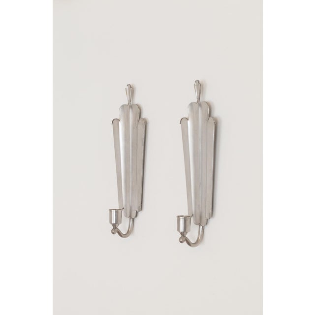 These two wall sconces from the Swedish Grace movement were manufactured in the 1930s by Schreuder & Olsson in Stockholm...