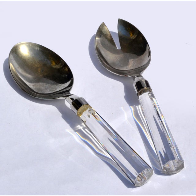 A Set of Christofle Hotel Style France Serving Spoons with Faceted crystal handles and polished Silver Plate metal bowls....