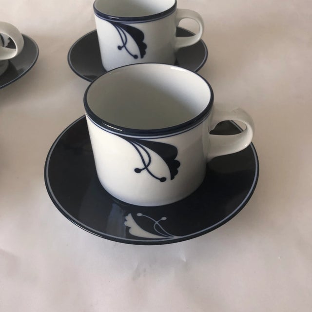 Vintage set of 4 blue Indigo and white Saucers and 4 Blue & White Teacups Makers Mark reads " Dansk International NR JAPAN...